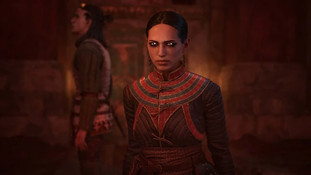 A character standing in a red-lit room in The Blood of Dawnwalker